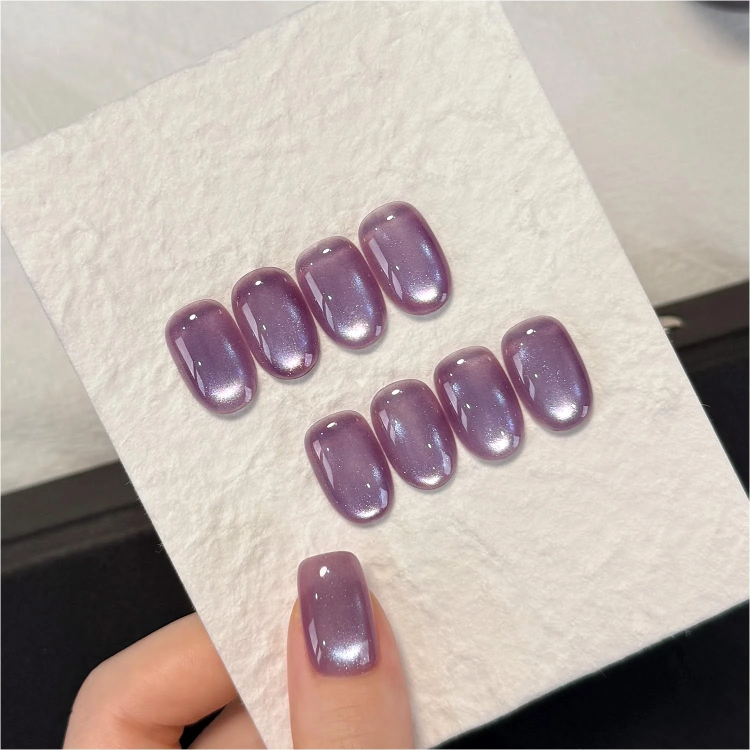 Purple cat eye gel polish for amethyst ring nails