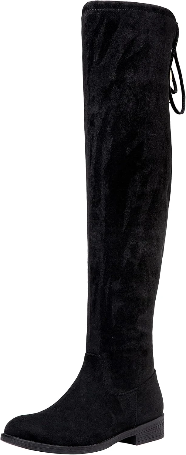 Women flat knee high boots worn to save suitcase space on travel days