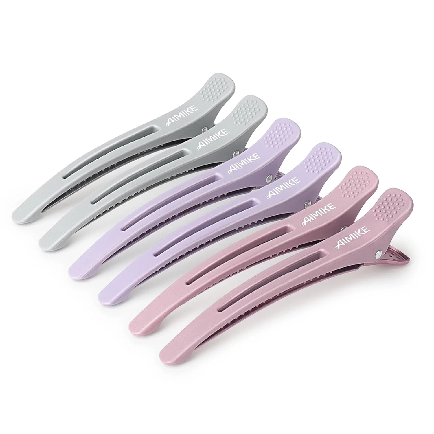 Women sectioning hair clips for blue accent placement