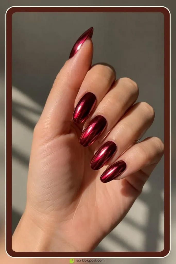 Cherry Nails Decoded: The Three Trends Hiding in One Name for 2026 37 Cherry chrome nails with mirror shine over red base