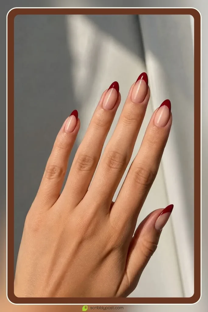 Graduation Nails Worth 40 Photos: 16 Sets to Try in 2026 21 Deep red tip graduation nails with edgy classic update