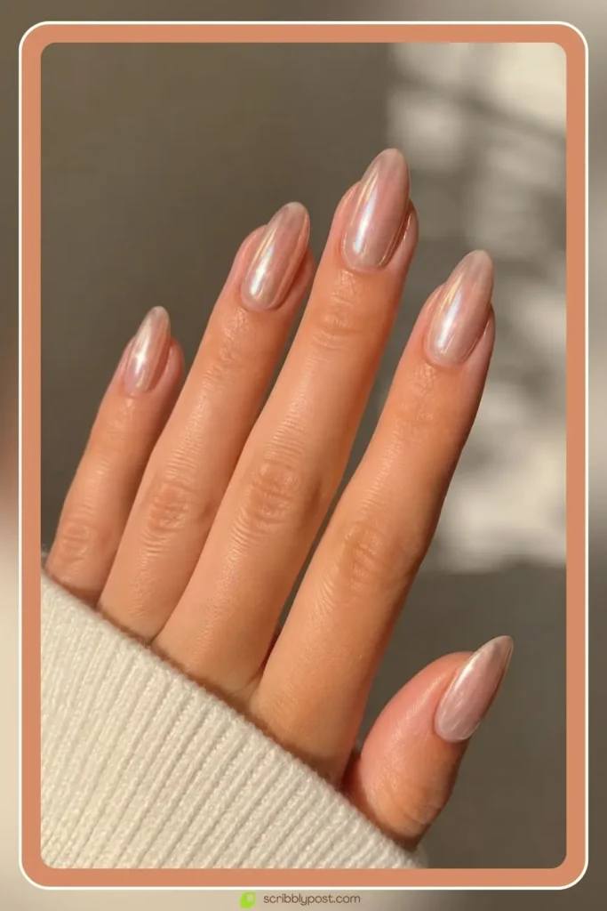 Engagement Nails for Every Ring Selfie: 16 Sets Worth the Wait in 2026 5 Glazed chrome neutral engagement nails with soft shimmer