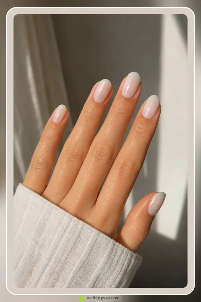 Glazed milky white nails with silky veil finish