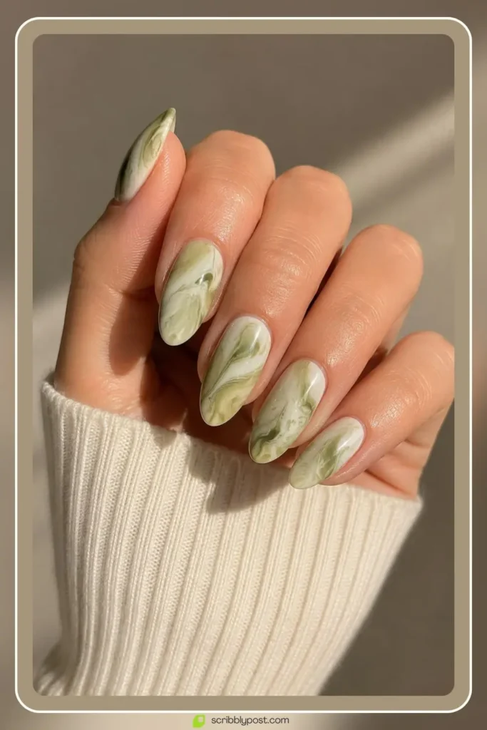 Green Nails Worth Saving: 16 Sets From Mint to Emerald for 2026 57 Matcha green and milk swirl nails in creamy marble