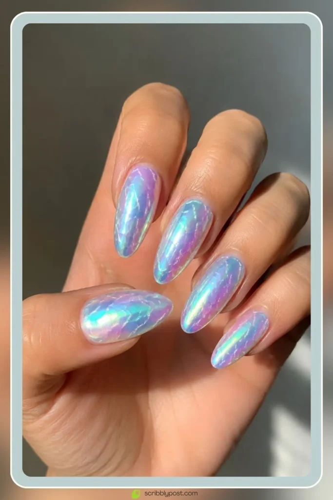 Mermaid Nails Decoded: 16 Ocean-Inspired Sets for 2026 9 Mermaid chrome nails with full iridescent mirror shine