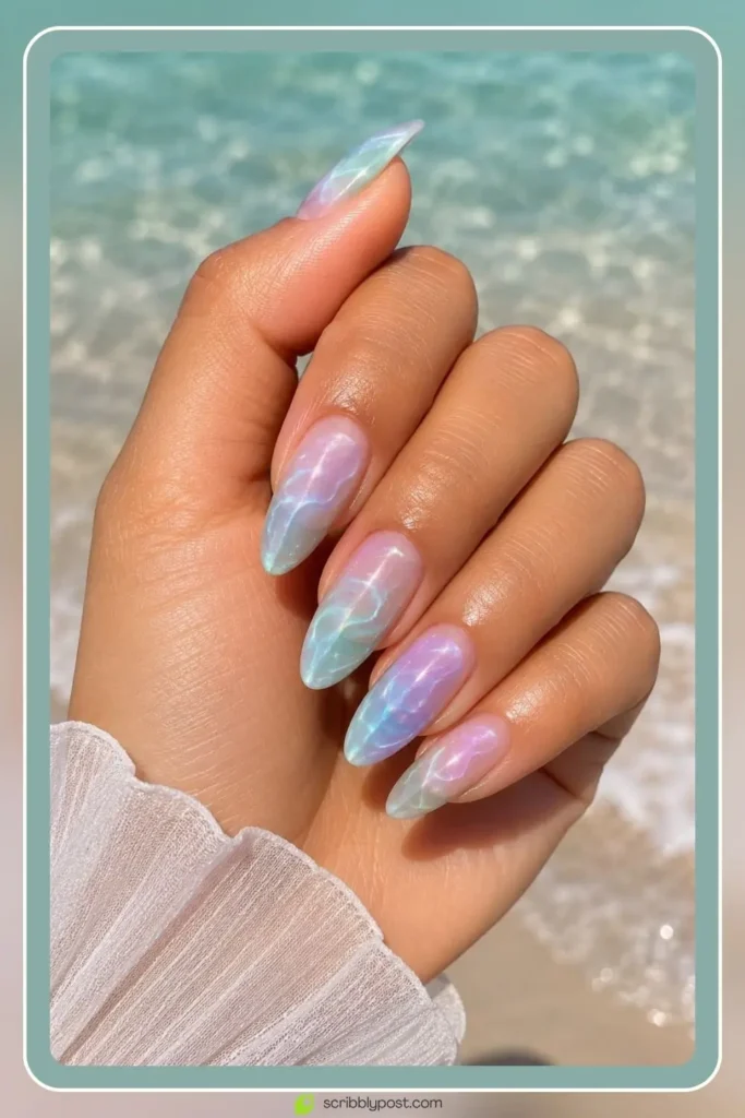 Mermaid Nails Decoded: 16 Ocean-Inspired Sets for 2026 37 Mermaid inspired nails in soft pastel ocean tones