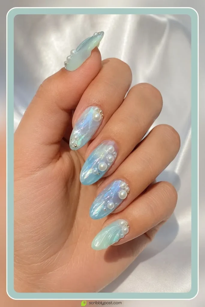 Mermaid Nails Decoded: 16 Ocean-Inspired Sets for 2026 45 Mermaid pearl gem nails with ethereal pearl accents on ocean base