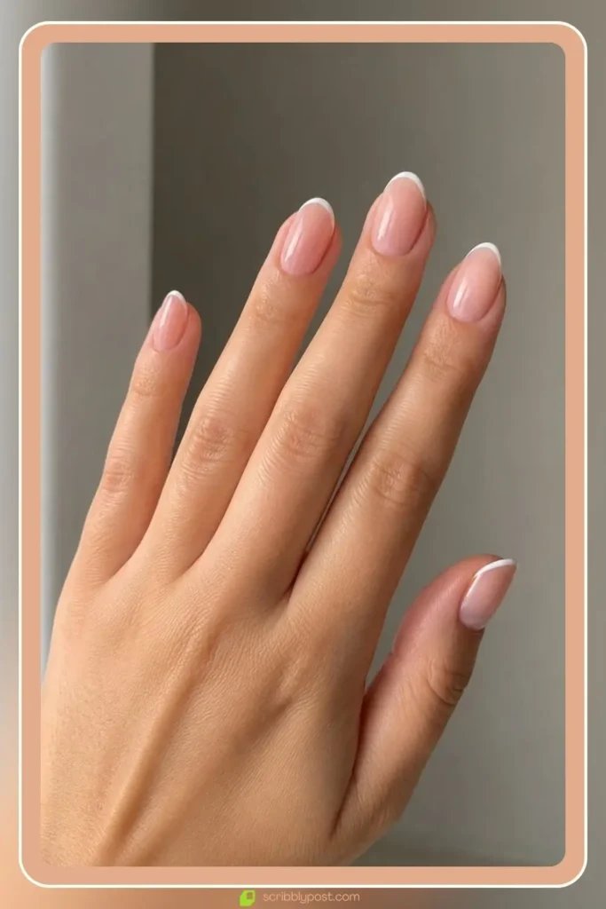 Engagement Nails for Every Ring Selfie: 16 Sets Worth the Wait in 2026 9 Micro french tip engagement nails with thin white line