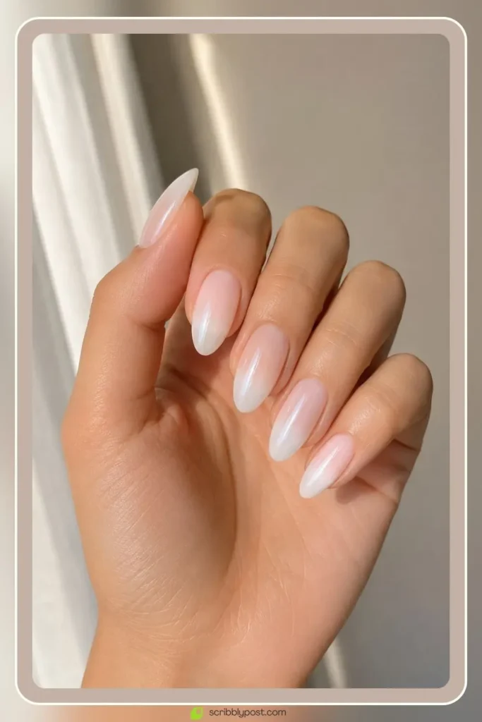 Graduation Nails Worth 40 Photos: 16 Sets to Try in 2026 1 Milky glazed almond graduation nails with soft luminous finish