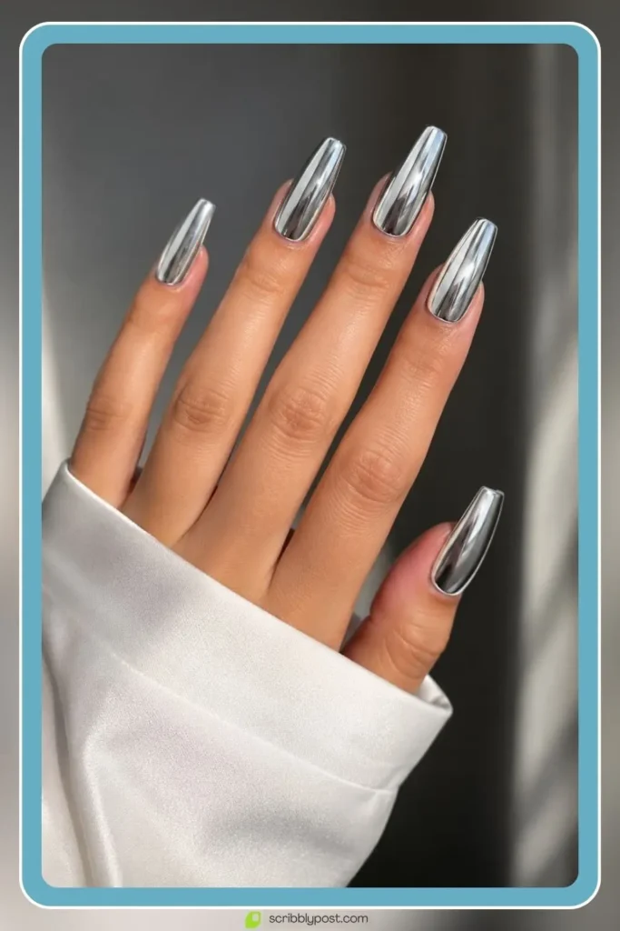 Graduation Nails Worth 40 Photos: 16 Sets to Try in 2026 9 Silver chrome coffin graduation nails with mirror shine finish