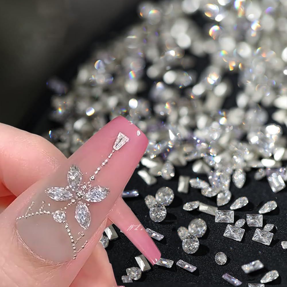 Engagement Nails for Every Ring Selfie: 16 Sets Worth the Wait in 2026 34 Women tiny crystal nail gems for classy engagement nails