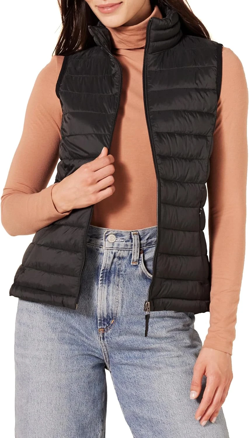 White Sweater Outfits: 16 Ways to Style the Piece That Goes With Everything 31 Black puffer vest for chunky white sweater layered outfit