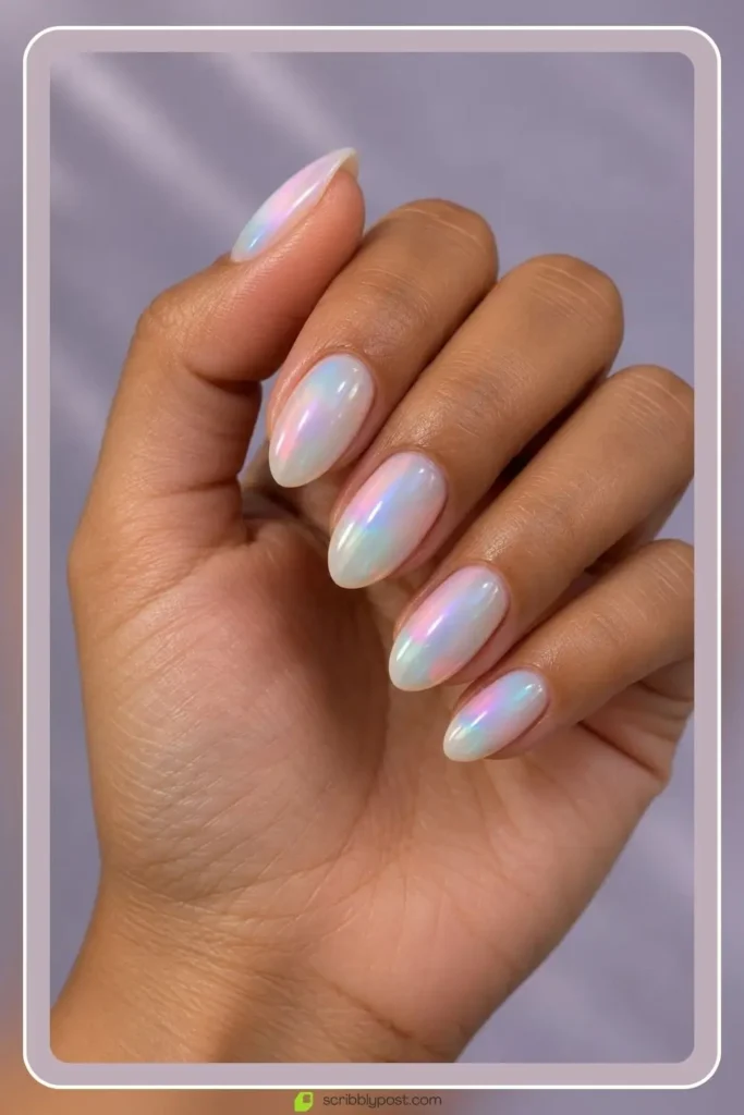 The October Nail Plan: What to Book, When, and How to Fit Halloween Into It 9 October birthday nails in a milky opal finish that shifts pink, blue and green
